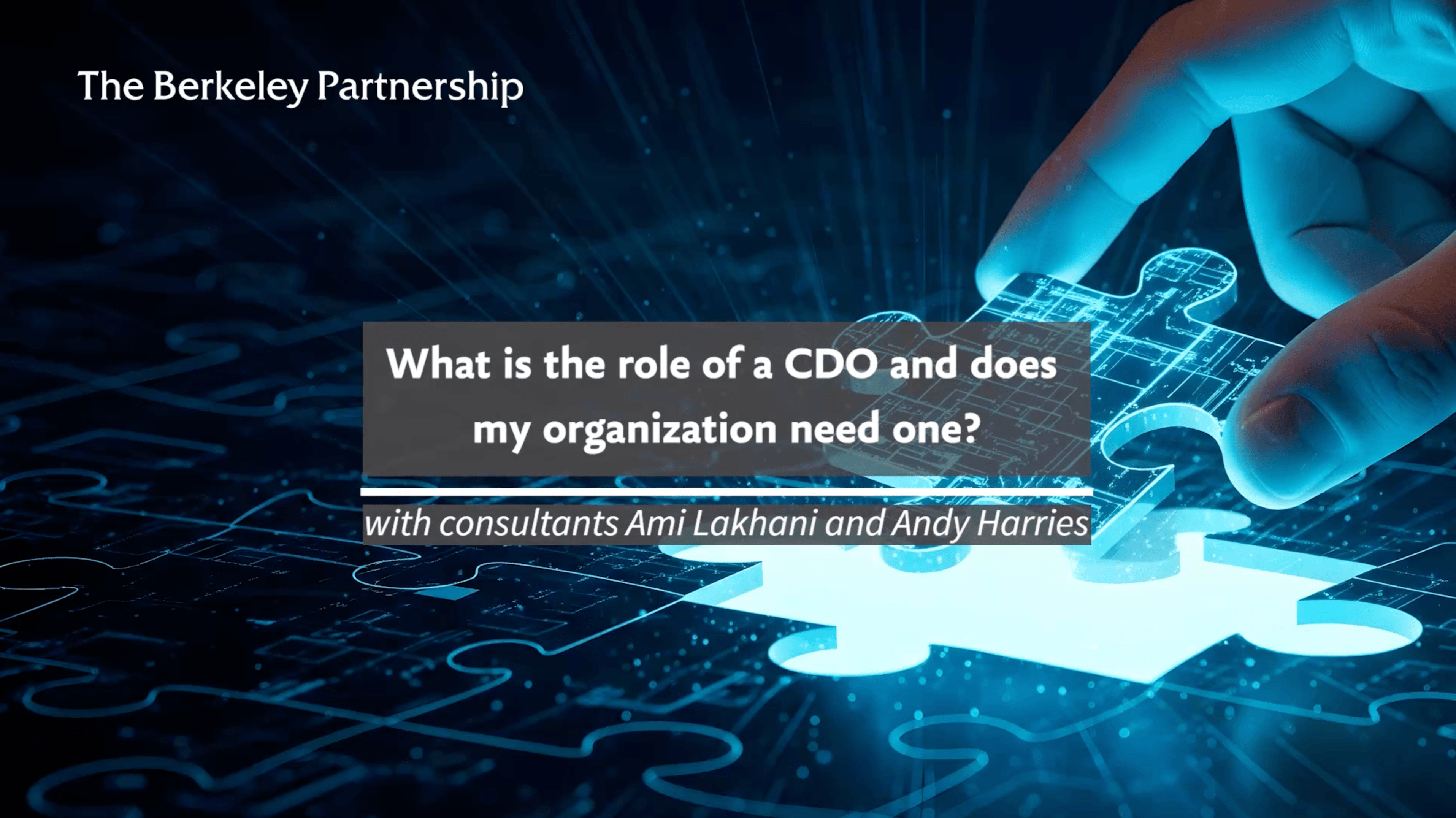 A hand is completing a jigsaw of a digital blueprint with the final missing piece. Text overlaid on top of the image says: What is the role of a CDO and does my organisation need one? With consultants