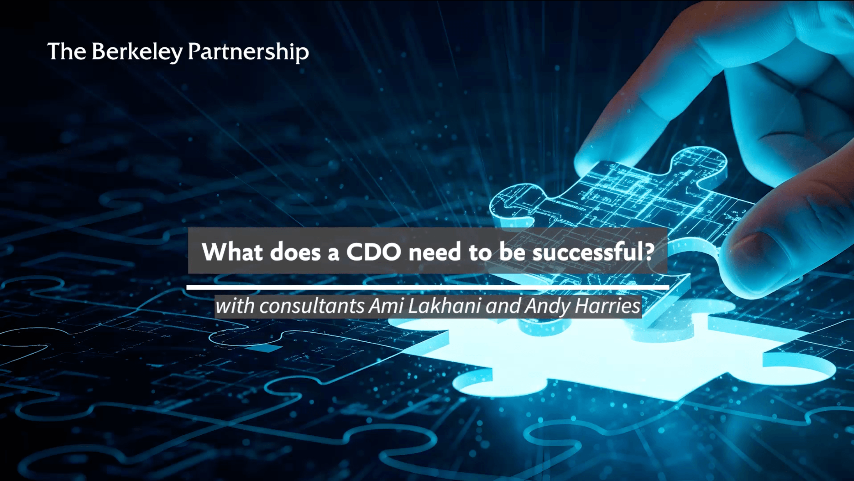A hand is completing a jigsaw of a digital blueprint with the final missing piece. Text overlaid on top of the image says: What does a CDO need to be successful? With consultants Ami Lakhani and Andy 
