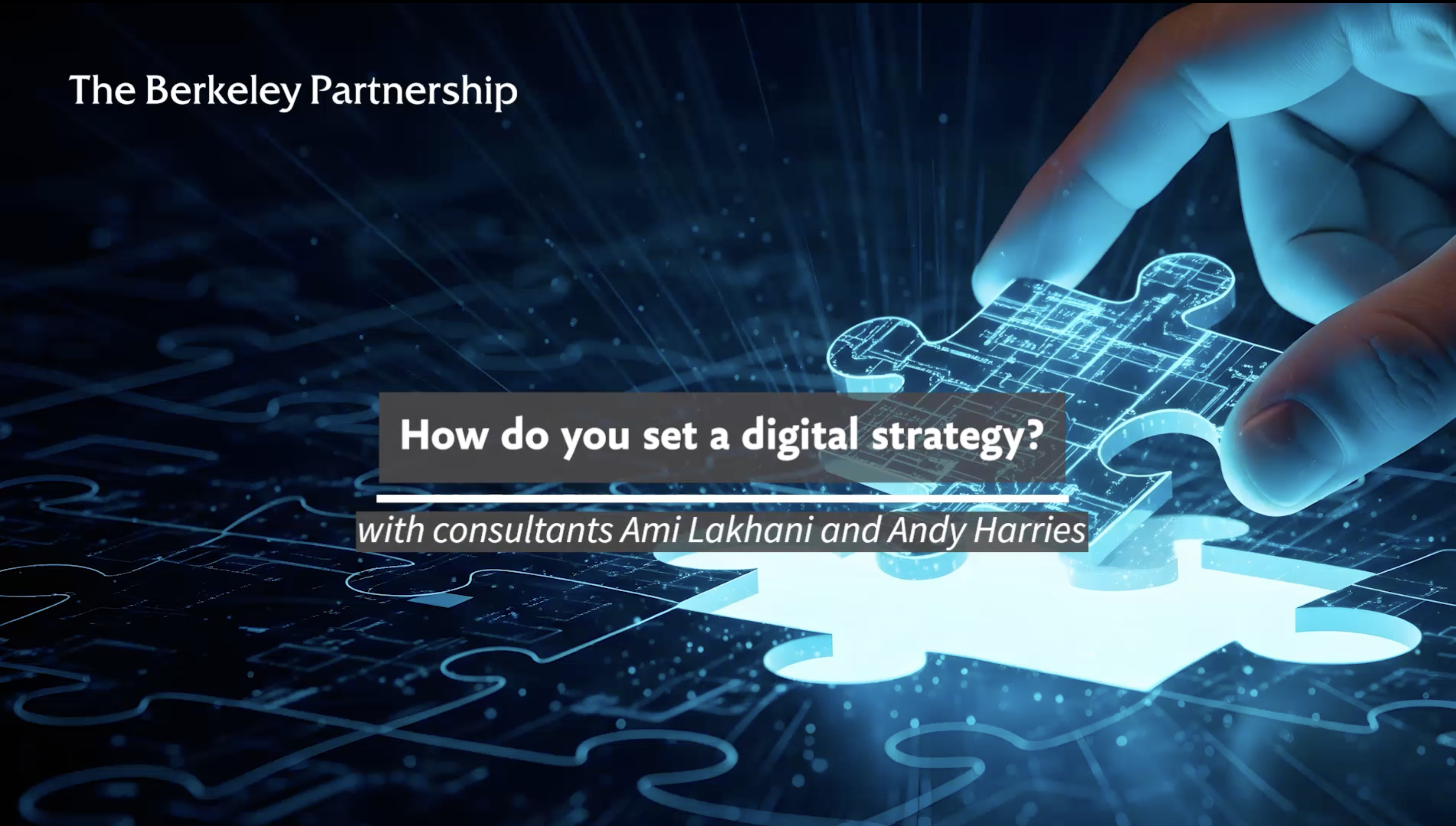 A hand is completing a jigsaw of a digital blueprint with the final missing piece. Text overlaid on top of the image says: How do you set a digital strategy? With consultants Ami Lakhani and Andy Harr