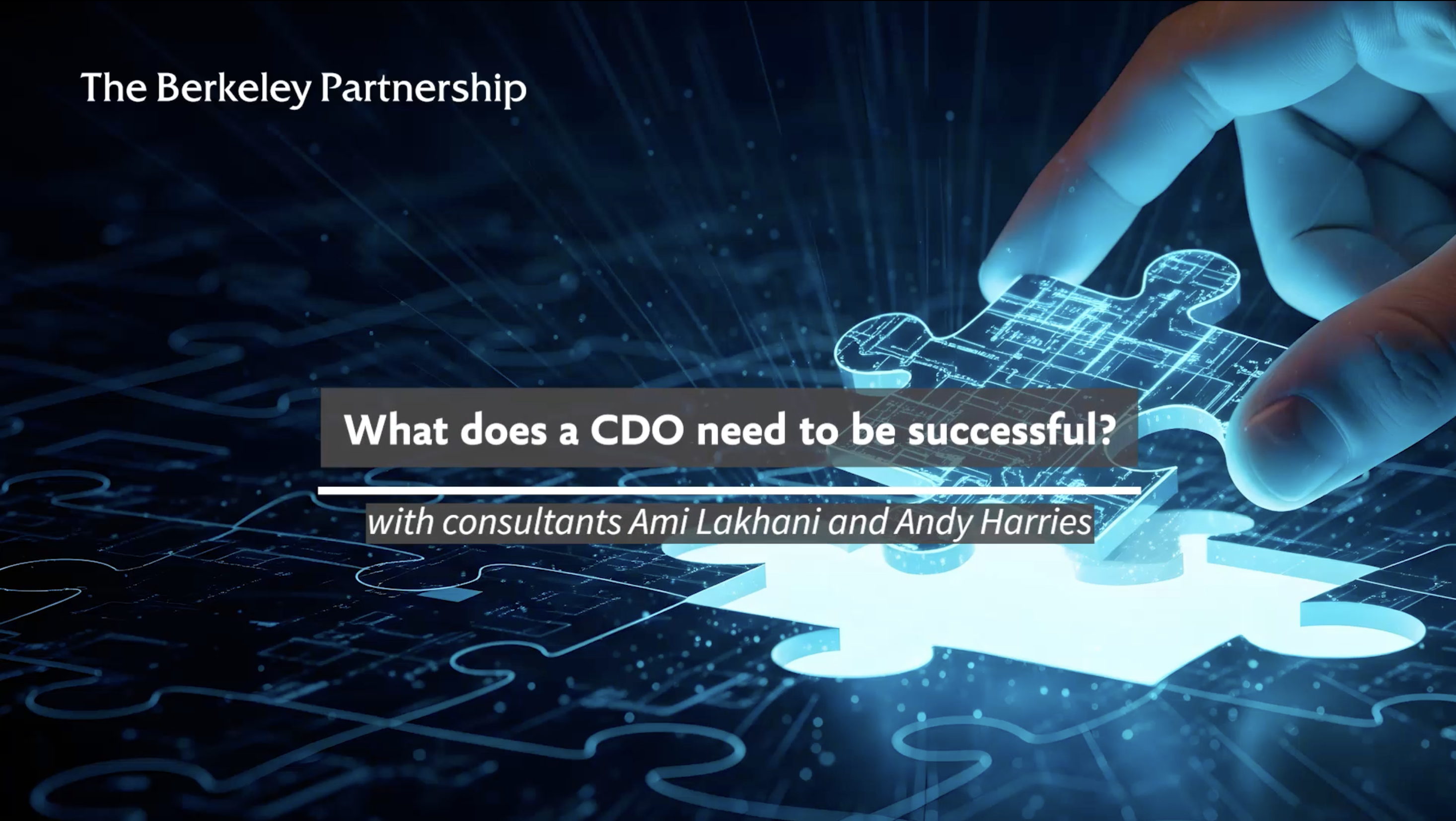 A hand is completing a jigsaw of a digital blueprint with the final missing piece. Text overlaid on top of the image says: What does a CDO need to be successful? With consultants Ami Lakhani and Andy 