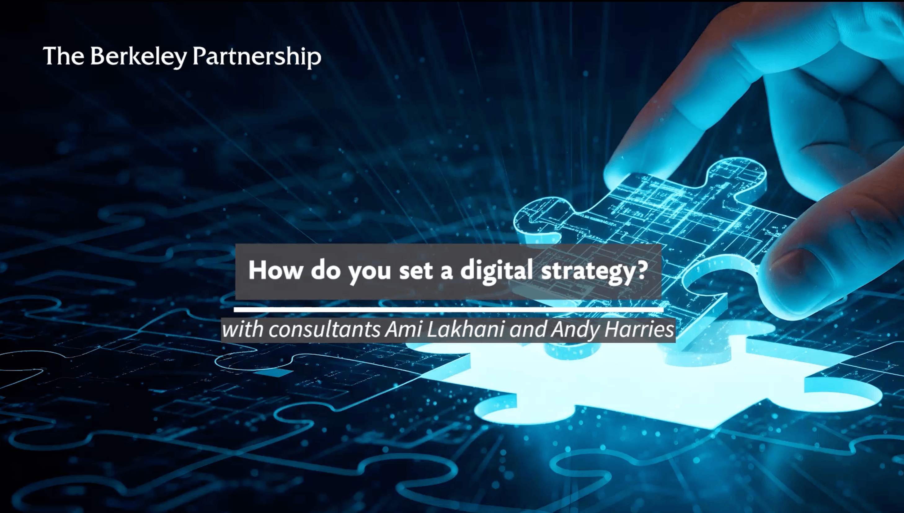 A hand is completing a jigsaw of a digital blueprint with the final missing piece. Text overlaid on top of the image says: How do you set a digital strategy? With consultants Ami Lakhani and Andy Harr